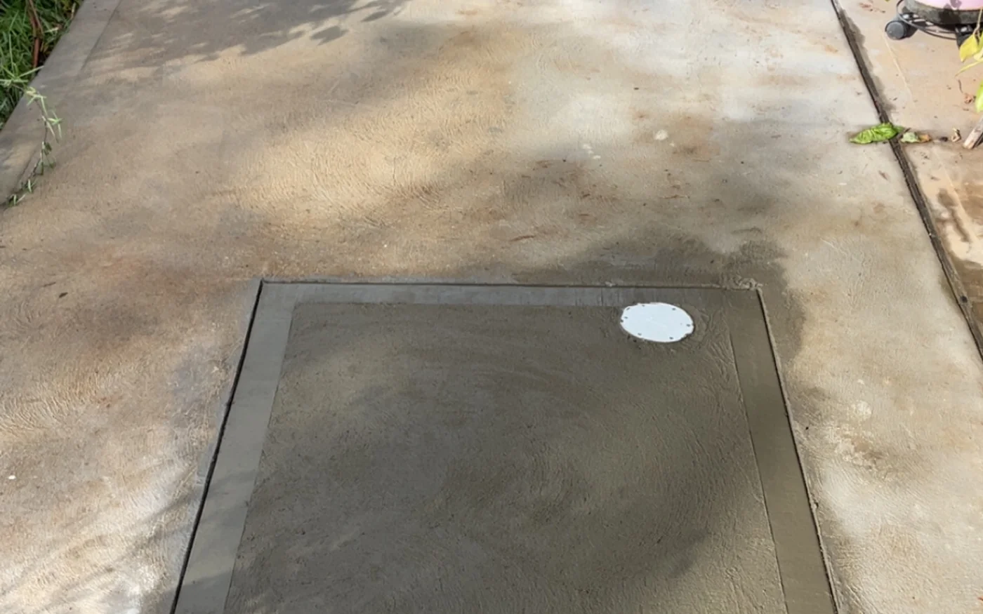 Concrete path reinstated over a completed drainage repair
