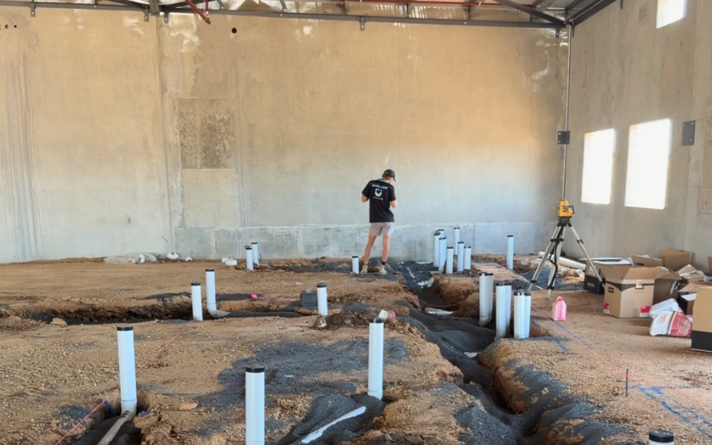 Sanitary drainage stacks roughed in ready for fixtures